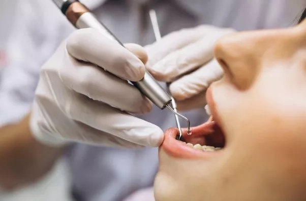 Pregnant mom having her teeth checked 