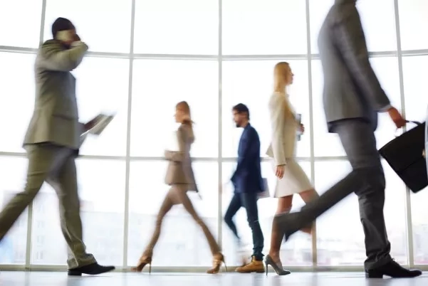 office workers walking around busily